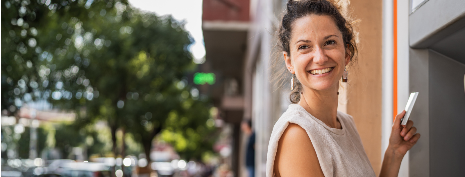 Laptop and Mobile Phone with Online Banking on the Screen